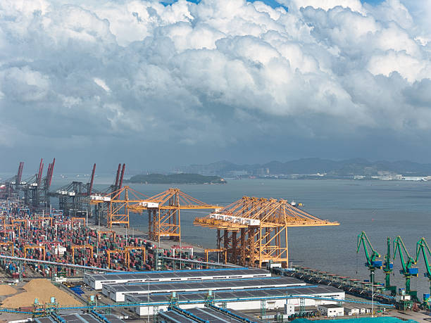 istock A Busy Port with Container Terminals and Cranes Under a Cloudy Sky 2237869042