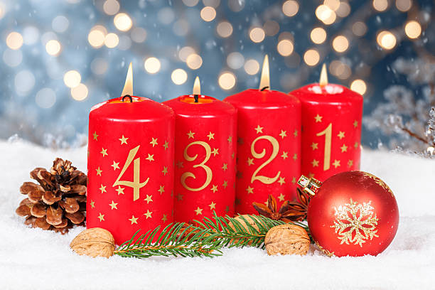 istock Fourth 4th Sunday in advent with burning candle Christmas time winter with copyspace copy space 2237871217