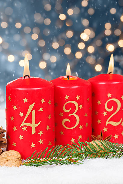 istock Fourth 4th Sunday in advent with burning candle Christmas time winter with copyspace copy space portrait format 2237871236