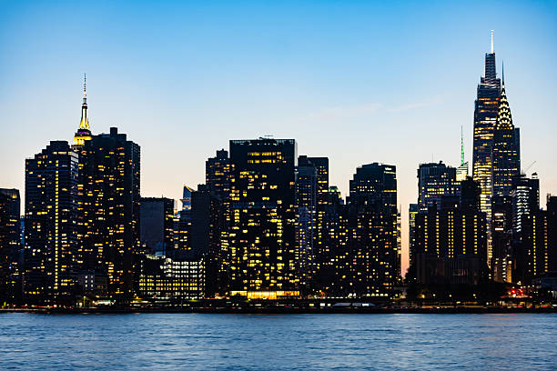 istock Manhattan Skyline View with East River at Twilight 2237871393