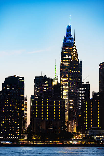 istock Manhattan Skyline View with East River at Twilight 2237871419
