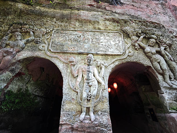 Entrance of the 18 Arhat cave at the Oriental Buddha Capital (Dongfang Fodu) in Leshan, China, known for its intricate rock carvings of numerous Buddha statues, bodhisattvas, and arhats. It is considered the fifth-largest Grotto group in China and a significant attraction alongside the famous Leshan Giant Buddha.