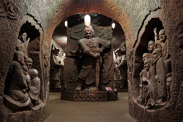 MARCH 2, 2024, PENGLAI CHINA: The golden statues of the eight immortals in the pavilion of Penglai, China