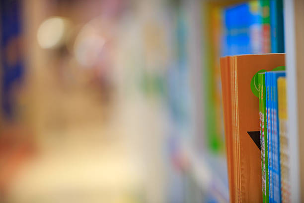 Books on a Shelf in a Library or Bookstore