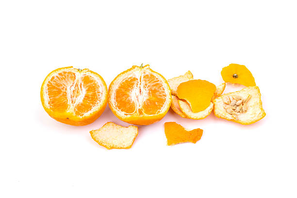 istock Orange with peel and seeds separated on white background - top view 2237874796