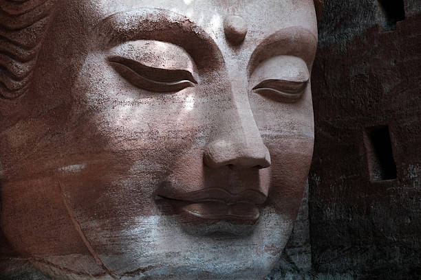 The 51 mt tall Pharmacist Buddha statue at the Oriental Buddhist theme park, an immense project started in 1989 which contains more than 10,000 Buddha statues carved in the same rock as the Leshan Giant Buddha in Sichuan Province, China, near the city of Leshan.