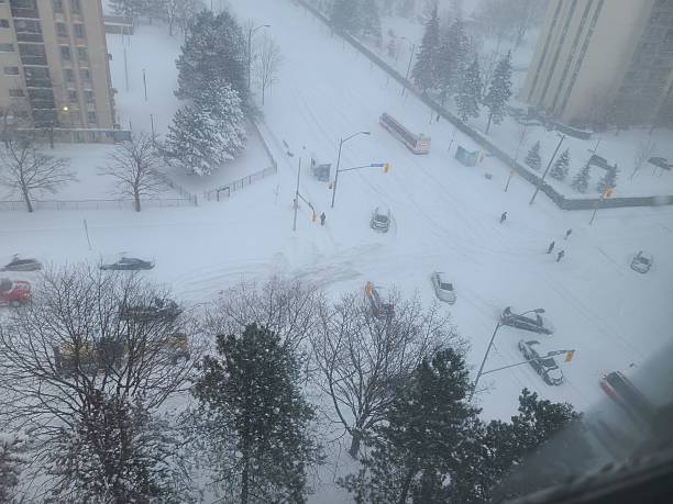 istock Snowstorm Traffic at Urban Intersection 2237878326