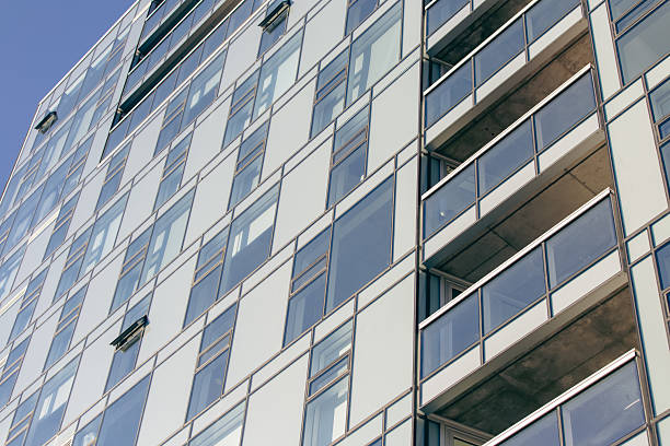 istock Modern Glass Building Facade With Balconies Seen From A Tilted Perspective 2237894410