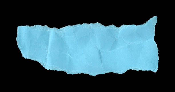 istock Blue wrinkled torn paper shape, ripped edges with strong creases, isolated design material for scrapbooking and textured art. 2237894643