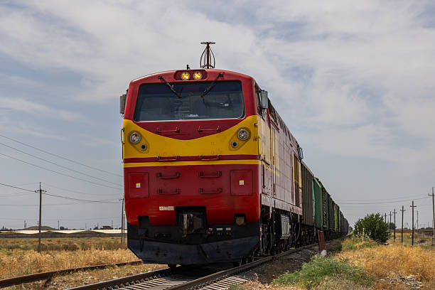 istock Freight train moving through serene rural landscape during daytime in Kyrgyzstan 2237894752