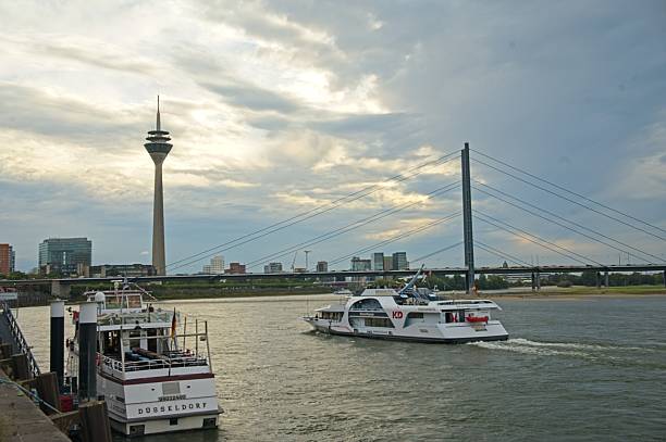 Dusseldorf, Germany - september 24, 2025 view over Rhine river and Oberkasseler Bridge in Dusseldorf