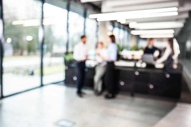 istock Businessmen blur in the workplace or work space of table in office room with computer or shallow depth of focus of abstract background 2237905041