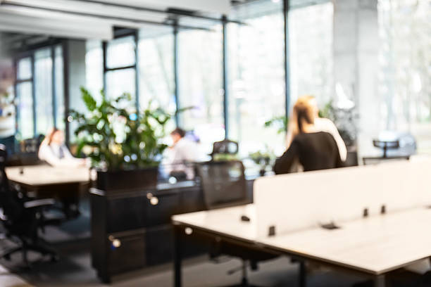 istock Blurred image of business people standing in the office 2237905258