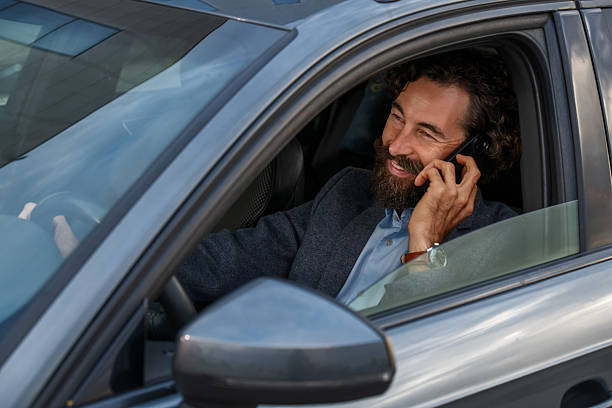 istock Careless Driver Using Phone Behind the Wheel – Safety Hazard Scene 2237909227