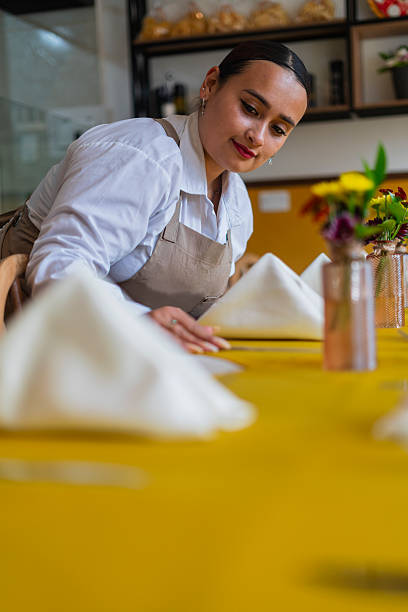 istock Restaurant owner gets ready to open the doors and start serving customers 2237914211