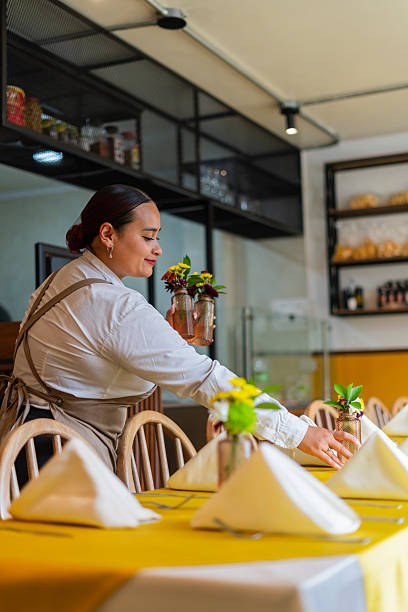 istock Restaurant owner gets ready to open the doors and start serving customers 2237914359