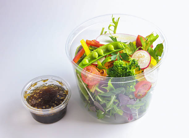 istock Fresh Creru salad with Includes sugar snap peas, broccoli, cherry tomatoes, radish slices, bell peppers, and Balsamic Vinaigrette isolated on white background 2237918995