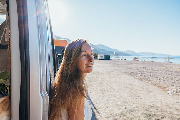 istock Woman Enjoying Sunny Beach Vacation View 2237926673