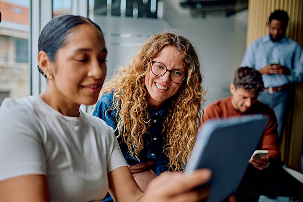 istock Diverse business team collaborating on digital tablet 2237932228