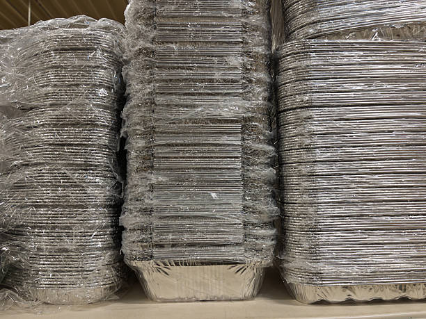 istock Stacked Aluminum Foil Baking Trays in Warehouse Setting 2237937036