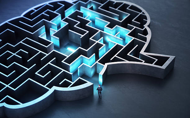 istock Businessman Walking Towards Blue Lighted Path in Dark Concrete Brain Shaped Maze 2237939213