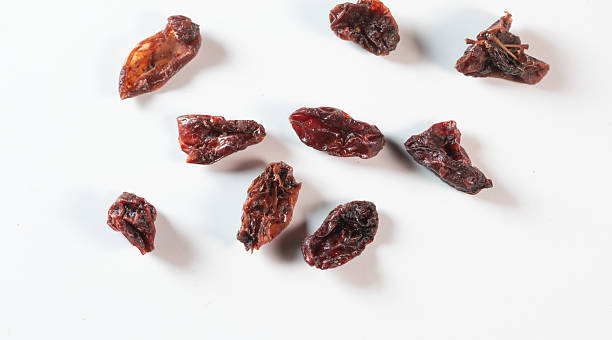 Nestled against a pristine white background, these studio shots capture the essence of traditional Chinese herbal decoction pieces. Each photograph highlights the unique texture, rich color, and natural form of ingredients. The clean, clinical aesthetic emphasizes purity and potency, making these images ideal for modern wellness brands, educational materials, and product packaging.