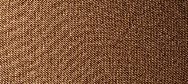 istock Close-Up of Brown Wool Fabric with Subtle Diagonal Weave 2237951140