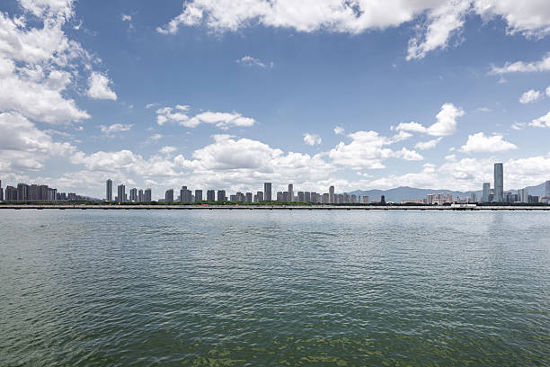 City Skyline and Blue Sky with Calm Waters in the Foreground