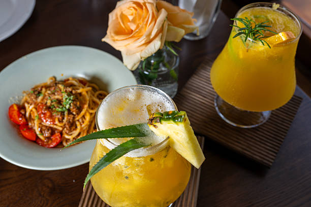 Delicious Italian Pasta Paired with Exotic Tropical Drinks
