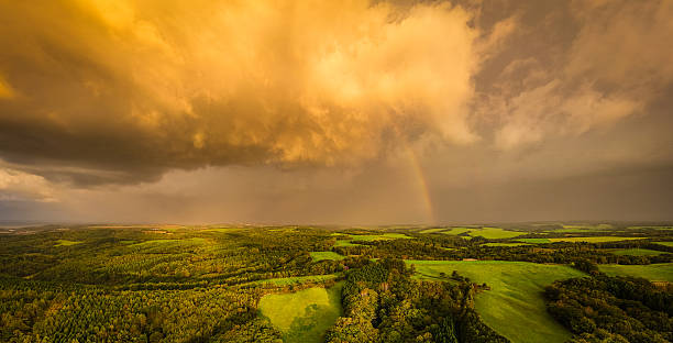 istock A dramatic rainbow stormy sky sunrise over rural Hokkaido 2237954483
