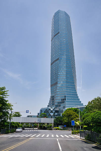 istock A Modern Skyscraper with Unique Architectural Design and Surrounding Urban Landscape 2237964870