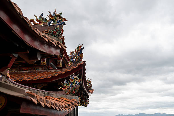 istock The Elaborate Eaves and Ridge Decorations of an Ancient Chinese Temple Under a Cloudy Sky 2237966694