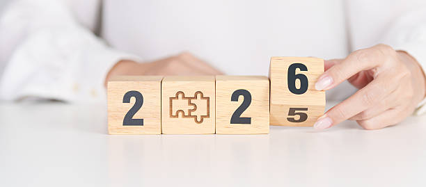 istock 2025 year change to 2026 year block with jigsaw puzzle icon. Business Process, Team, teamwork, Goal, mission, Resolution, strategy, plan, Action, partnership, and New Year start 2237969444