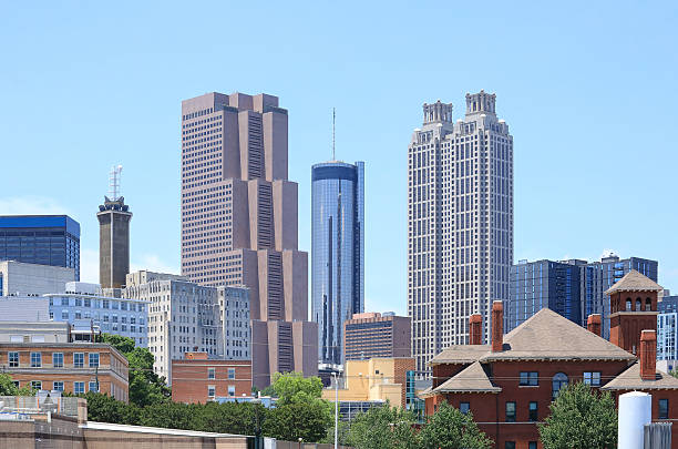 Clouds covering skyscrapers in Downtown of Atlanta, Georgia. Hotels and office building exterior of capital city
