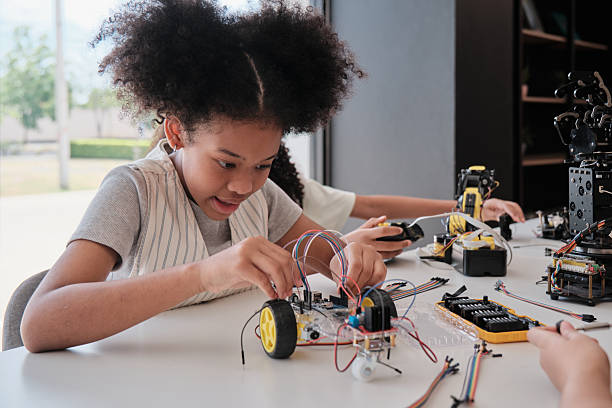 istock Black student girl robotic design in a science and engineering classroom. 2237970191