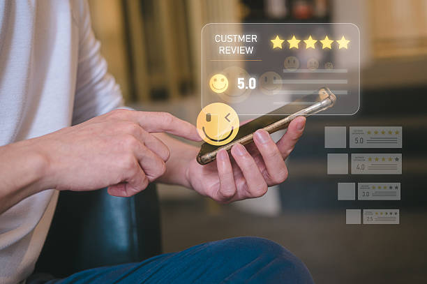 istock Customer using smartphone with online review and rating stars interface overlay, customer satisfaction representing feedback, online reputation, business quality, and digital user experience. 2237970303