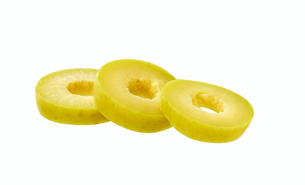 istock pitted green olives, sliced ​​into rings isolated on white background. 2237970337