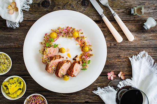 istock Grilled pork loin steaks with potatoes on wooden table 2237970376