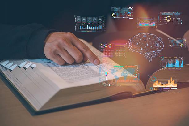 istock Close-up of businessman reading text book with data chart overlay graphs, statistics, and book, symbolizing financial analysis, education, research, stock market, investment, and business strategy. 2237970463