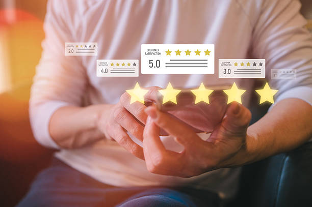 istock Customer using smartphone with online review and rating stars interface overlay, customer satisfaction representing feedback, online reputation, business quality, and digital user experience. 2237970485
