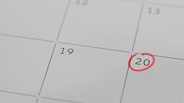 istock Calendar page with the 20th date marked with a red circle, symbolizing an important reminder 2237971676