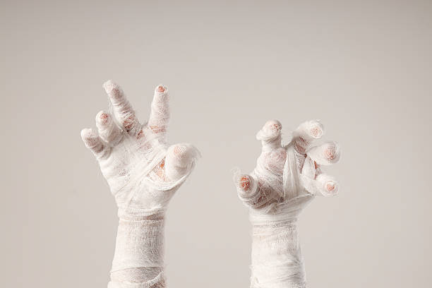 istock The mummy's hands are wrapped in a bandage 2237973572