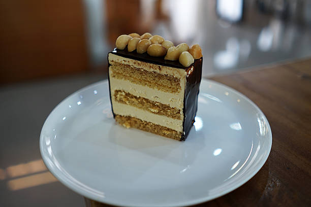 Close up Chocolate and butter layer caked topped with Macadamia nut