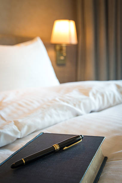 istock A book and fountain pen on the bed 2237975406