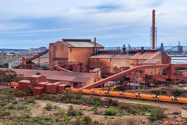 istock Steelworks with Iron Ore Train Unloading on an Overcast Day 2237976957