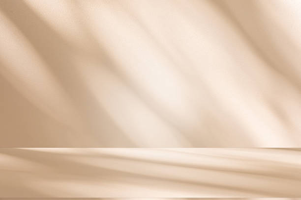 istock Studio style background wall decoration presentation uses white and beige tones. with shadows cast from a nearby window, concept creating a decorative 2237978175