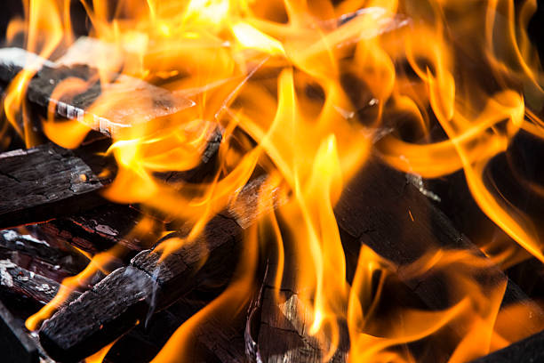 istock fire. campfire. burning drome. close-up photo of a flame. cooking over a fire. starting a fire 2237978791