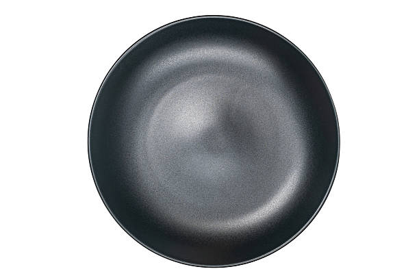 istock Top view or flat lay of single empty black ceramic plate. 2237981653
