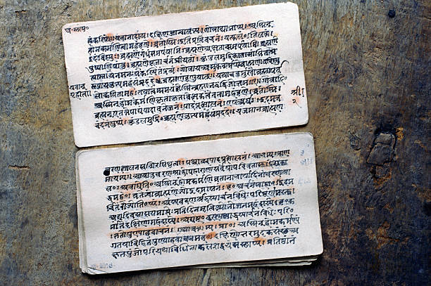 istock Old indian hindu sacred scriptures veda text sanskrit script paper india 2237986560