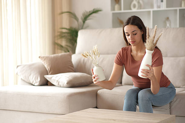 istock Woman deciding about living room decoration 2237986800
